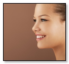 woman smiling about her dental implants